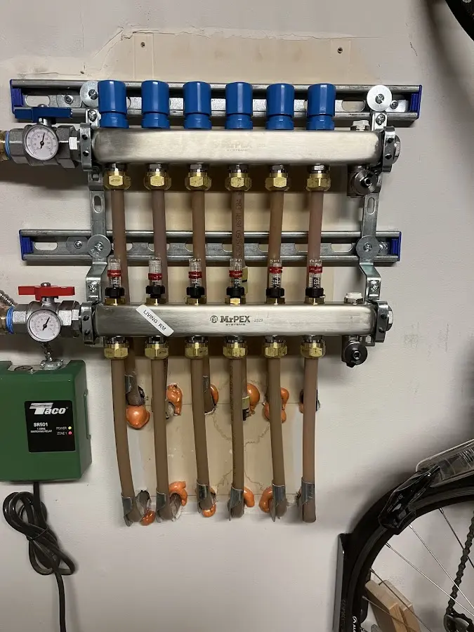 Plumber performing Leak Detection at a residential property in Ballville